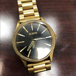 Gold Nixon watch